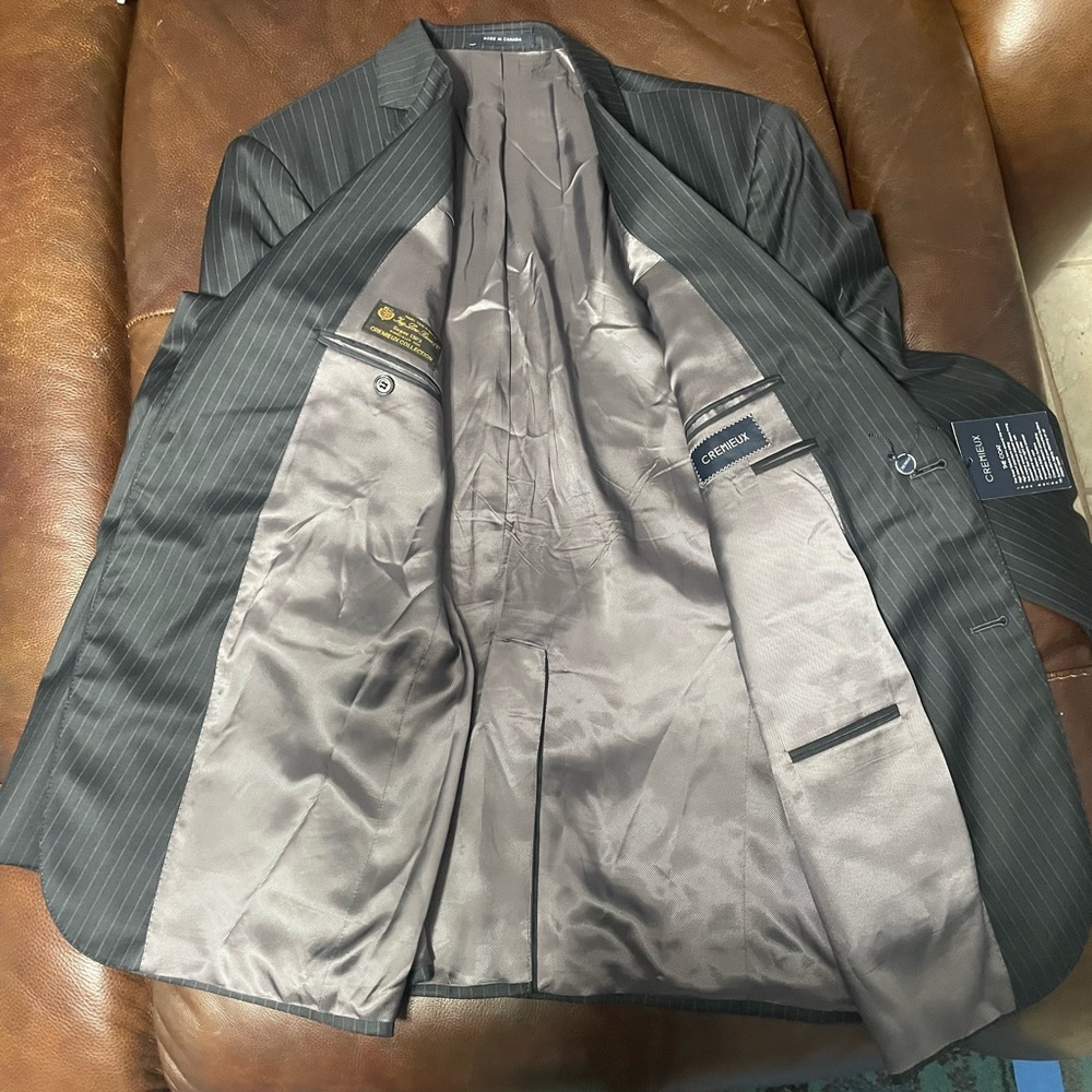 Grey sports coat, size 44R, smoke free and pet free home.